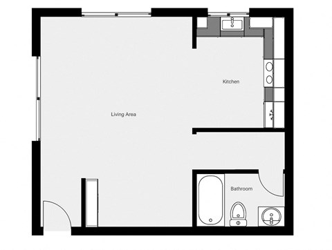 A floor plan of a house with a kitchen, living area and bathroom.